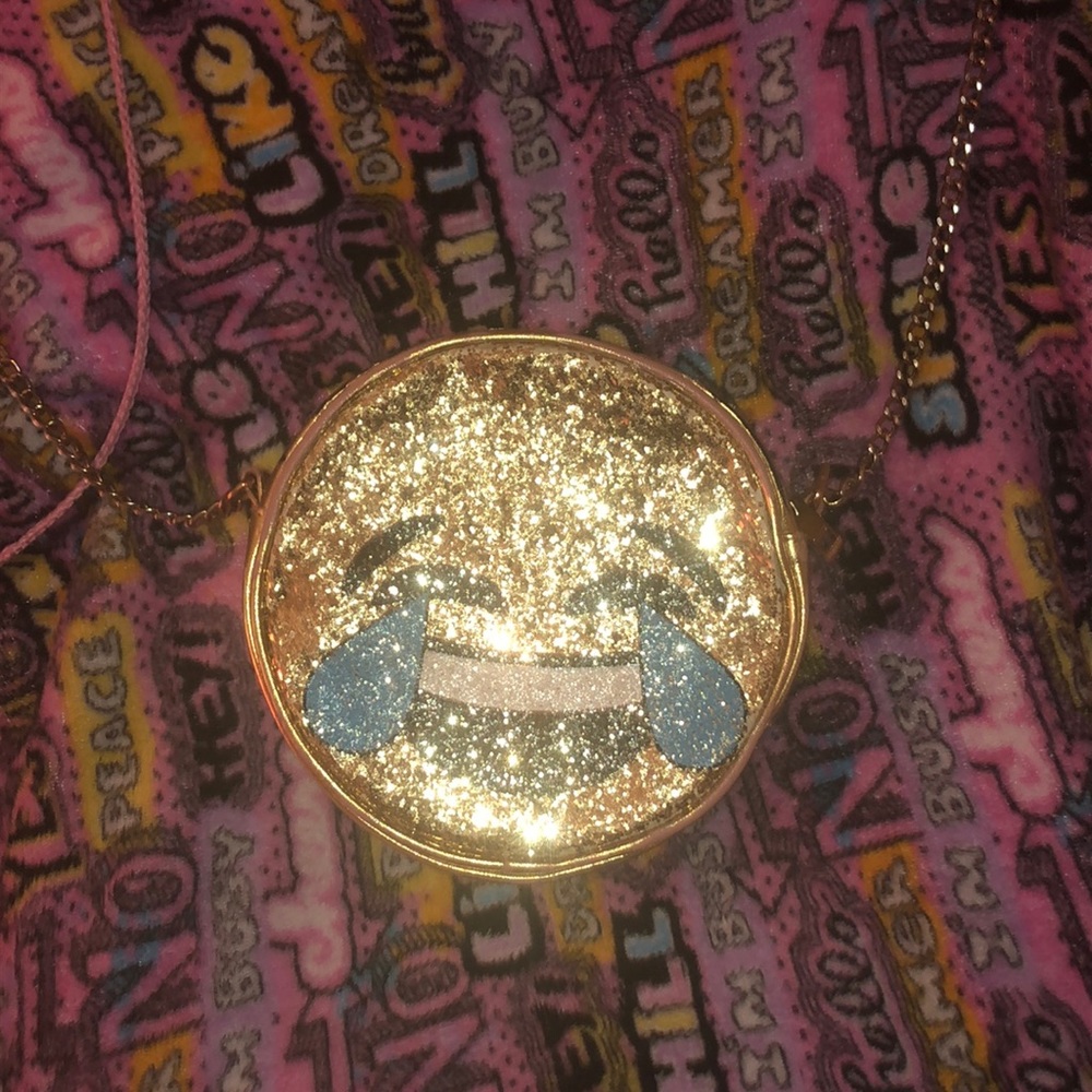 Gold emoji purse